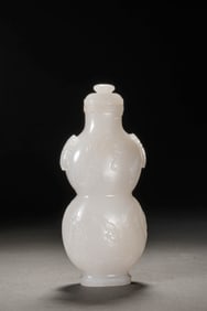 A WHITE JADE DOUBLE-GOURD VASE
