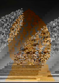 A GILT-BRONZE FIGURE OF BUDDHA