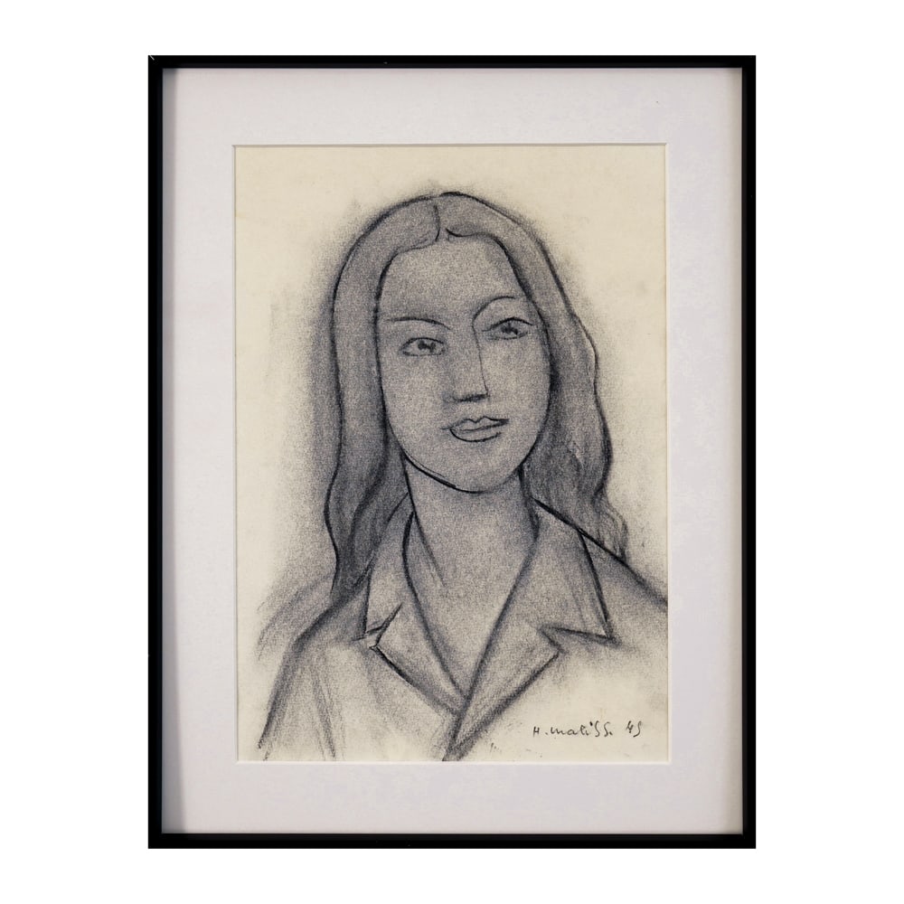 HENRI MATISSE (1869-1954), ATTRIBUTED TO, CHARCOAL ON PAPER: Signed (lower right) Image Dimensions: 14 3/8 x 10 1/8 in (36.6 x 25.6 cm) Frame Dimensions: 18 3/4 x 14 3/8 in (47.6 x 36.5 cm) Created in 1948, this charcoal portrait of a woman exemplifies Henri Ma