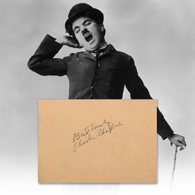 CHARLIE CHAPLIN SIGNED AUTOGRAPH PAGE WITH INSCRIPTION
