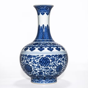 A QIANLONG PERIOD BLUE AND WHITE 'FLORAL SCROLL' VASE