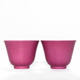 A PAIR OF KANGXI PERIOD MONOCHROME ROUGE-GLAZED CUPS