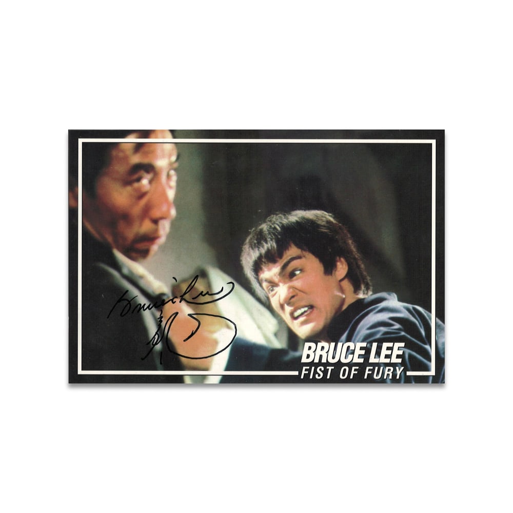 BRUCE LEE SIGNED FIST OF FURY POSTCARD: 6 1/8 x 4 1/8 in (15.5 x 10.5 cm) This signed Fist of Fury postcard represents a powerful artifact from one of the most influential moments in global cinema history. Bruce Lee stands as a transformati