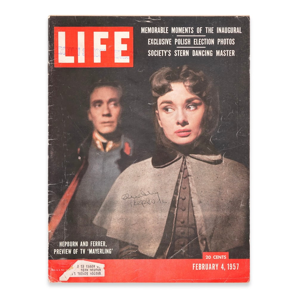 AUDREY HEPBURN SIGNED "LIFE" MAGAZINE, FEBRUARY 4, 1957: 14 x 10 1/2 in (35.5 x 26.7 cm) Provenance and Authentication: This collectible has undergone a rigorous forensic evaluation. The signatures were carefully analyzed across multiple criteria,