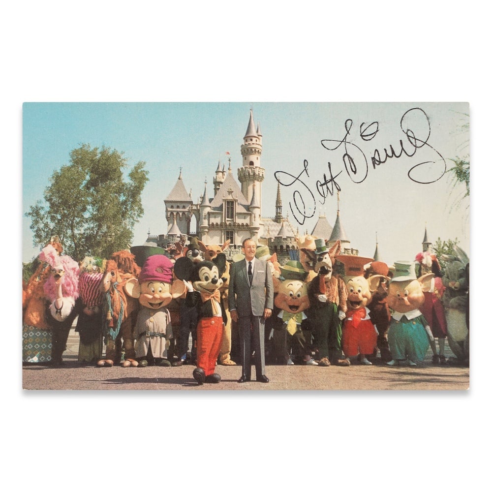 WALT DISNEY SIGNED DISNEYLAND POSTCARD: 5 1/2 x 3 1/2 in (14 x 9 cm) Provenance and Authentication: This collectible has undergone a rigorous forensic evaluation. The signatures were carefully analyzed across multiple criteria, including in