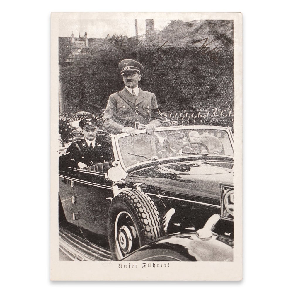 ADOLF HITLER SIGNED "UNSER FÜHRER!" POSTCARD: 5 1/2 x 3 1/2 in (13.9 x 9 cm) Adolf Hitler remains one of the most consequential and controversial political figures of the twentieth century. As the leader of Nazi Germany and the central figure of