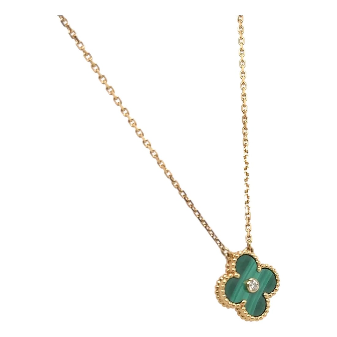 ALHAMBRA STYLE GOLD NECKLACE WITH MALACHITE CLOVER MOTIF AND DIAMOND ACCENT: ALHAMBRA STYLE GOLD NECKLACE WITH MALACHITE CLOVER MOTIF AND DIAMOND ACCENT Description: The pendant is formed as a symmetrical quatrefoil motif, set with a polished malachite panel exhibiting charact