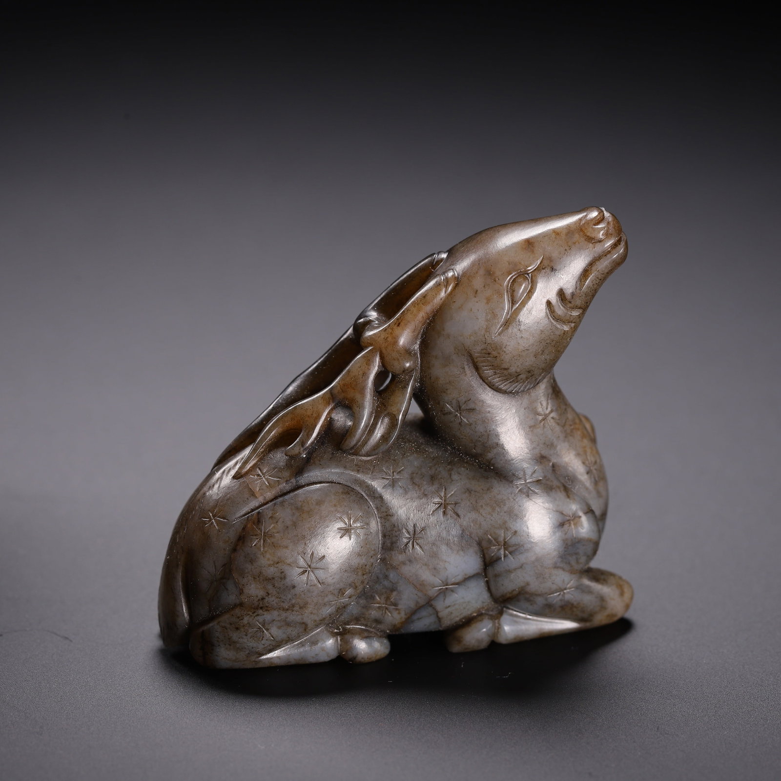 AN ARCHAIC JADE AUSPICIOUS BEAST (1 of 9)