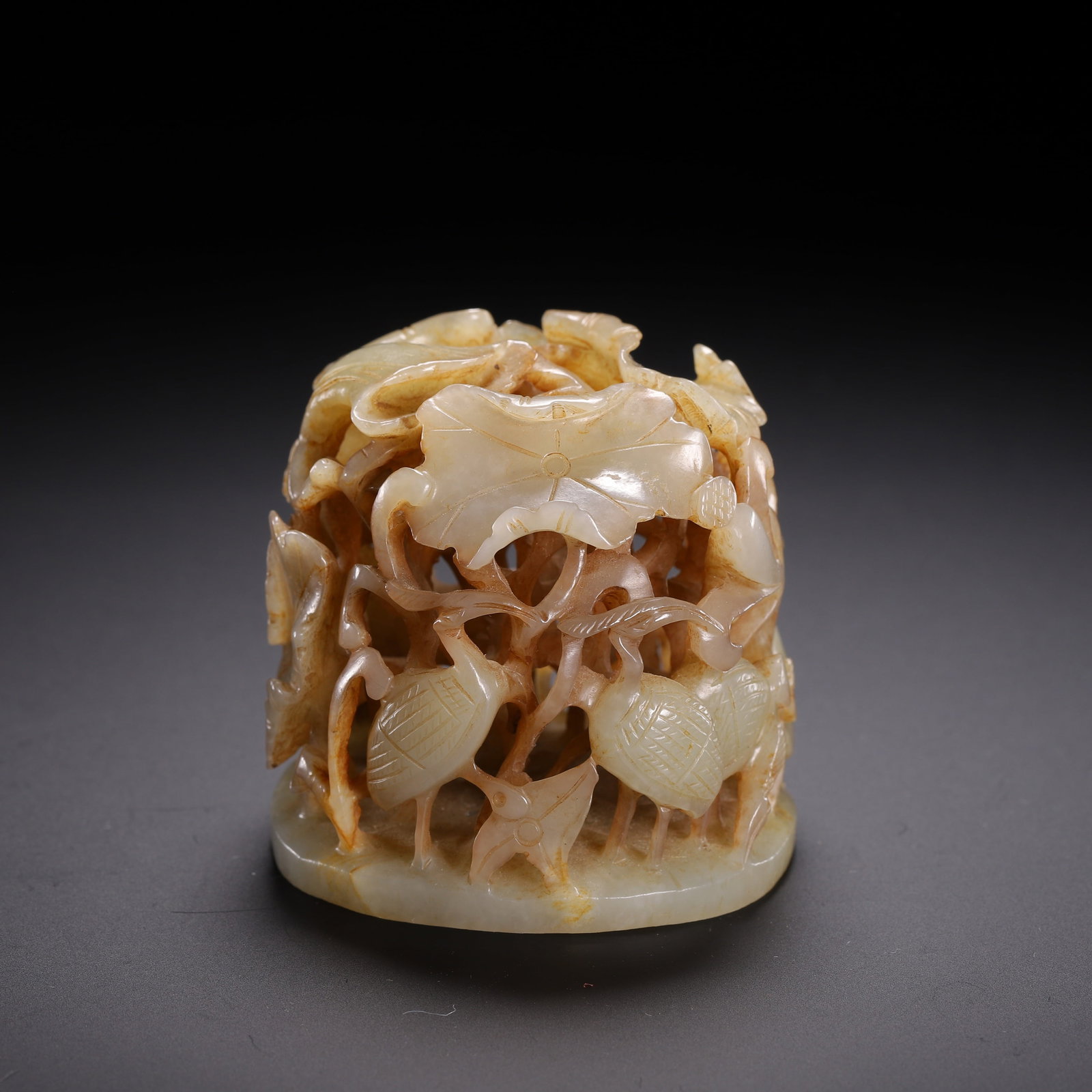 AN ARCHAIC JADE CENSER TOP: AN ARCHAIC JADE CENSER TOP Dimensions: Dimensions: Length: 5.5 cm (2.17 in.), Width: 5 cm (1.97 in.), Height: 6 cm (2.36 in.). Weight: 120 g. All measurements are approximate.