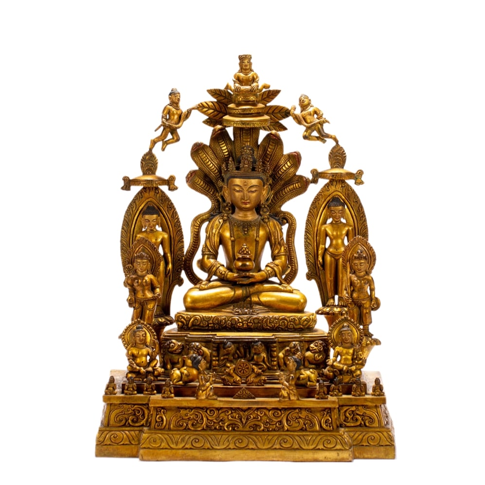 A GILT-BRONZE BUDDHA FIGURE: A GILT-BRONZE BUDDHA FIGURE Dimensions: Dimensions: Length: 27 cm (10.63 in.), Width: 20 cm (7.87 in.), Height: 37 cm (14.57 in.). Weight: 9210 g. All measurements are approximate.