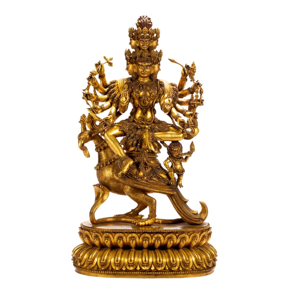 A GILT-BRONZE BUDDHA FIGURE: A GILT-BRONZE BUDDHA FIGURE Dimensions: Dimensions: Length: 29 cm (11.42 in.), Width: 21 cm (8.27 in.), Height: 55 cm (21.65 in.). Weight: 14770 g. All measurements are approximate.