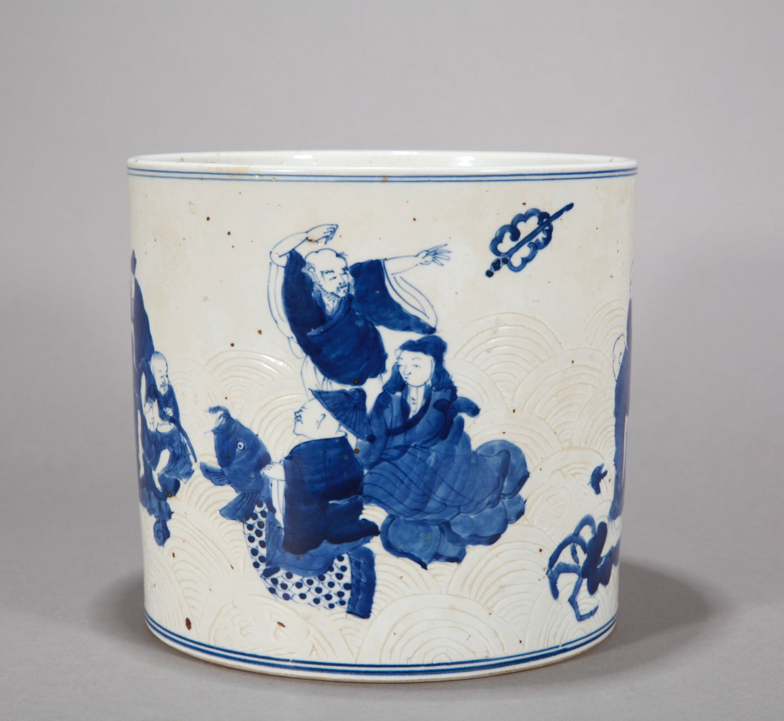 A BLUE AND WHITE 'FIGURES' BRUSH POT: A BLUE AND WHITE 'FIGURES' BRUSH POT Dimensions: Diameter: 19.5 cm (7.68 in.) x Height: 18 cm (7.09 in.). All measurements are approximate.
