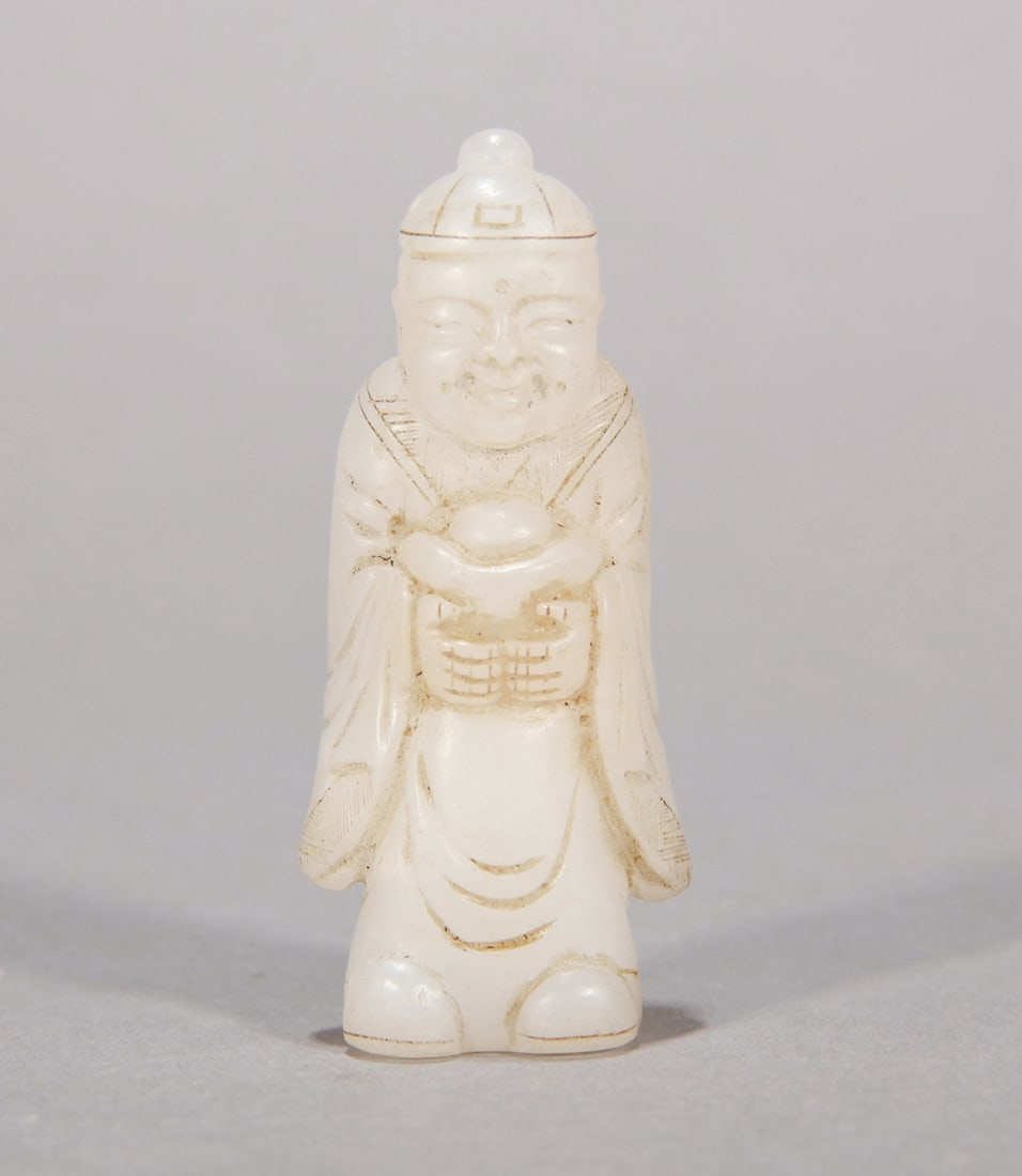 A WHITE JADE FIGURE (1 of 5)