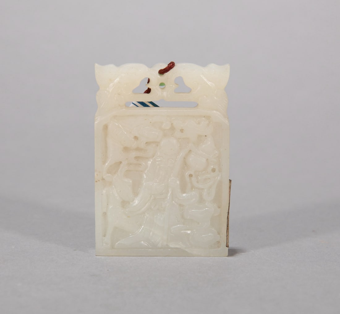 A WHITE JADE 'SHOU XING' PENDANT: A WHITE JADE 'SHOU XING' PENDANT Dimensions: Dimensions: Width: 6 cm (2.36 in.) x Height: 4.2 cm (1.65 in.). All measurements are approximate.