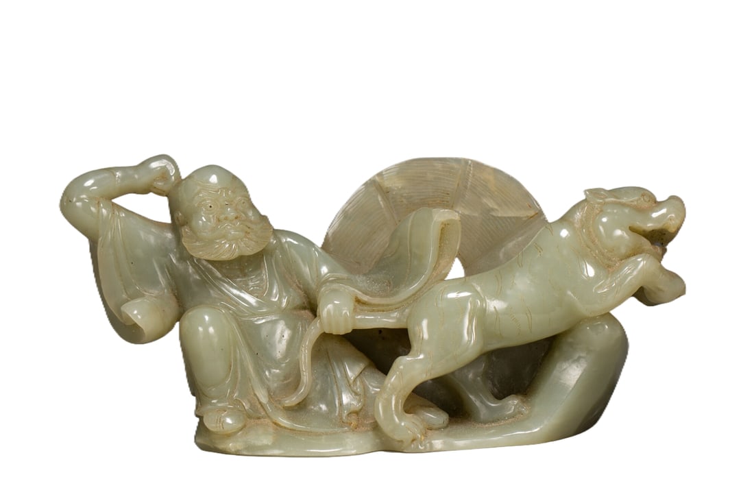 A HETIAN JADE LUOHAN FIGURE: A HETIAN JADE LUOHAN FIGURE Dimensions: Dimensions: Length: 17 cm (6.69 in.), Width: 5.5 cm (2.17 in.), Height: 7.5 cm (2.95 in.). Weight: 520 g. All measurements are approximate.