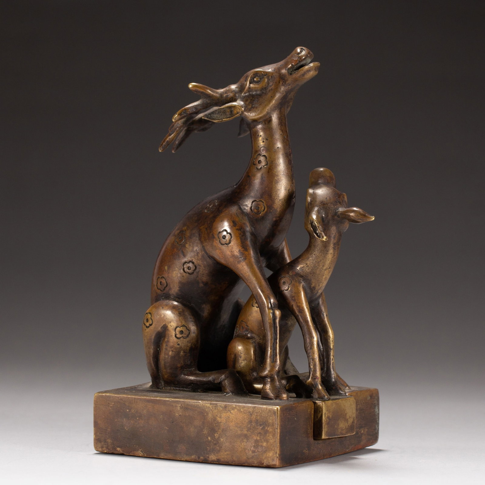 A BRONZE SEAL: A BRONZE SEAL Dimensions: Dimensions: Length: 6.8 cm (2.68 in.), Width: 6.5 cm (2.56 in.), Height: 13 cm (5.12 in.). Weight: 1220 g. All measurements are approximate.