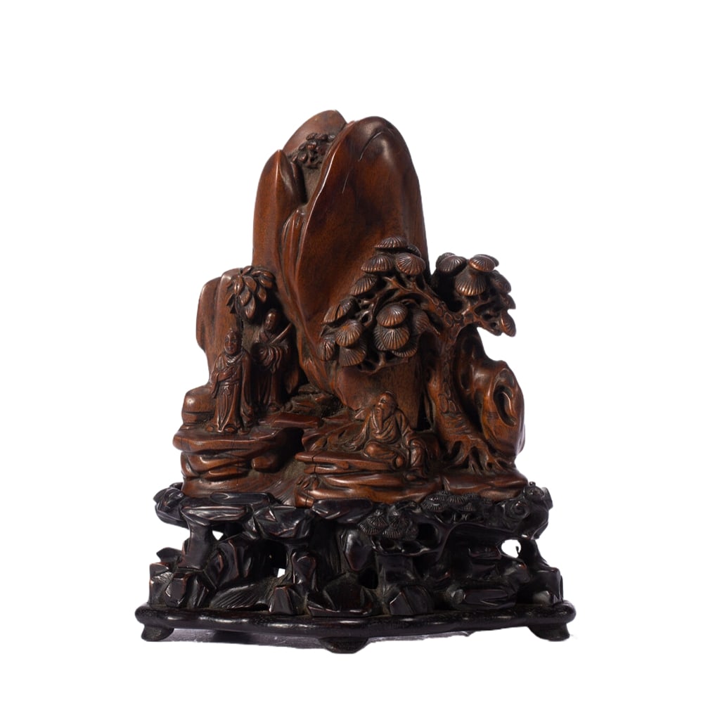 A SANDALWOOD MOUNTAIN-FORM ORNAMENT: A SANDALWOOD MOUNTAIN-FORM ORNAMENT Dimensions: Dimensions: Length: 11 cm (4.33 in.), Width: 5 cm (1.97 in.), Height: 13.5 cm (5.31 in.). Weight: 160 g. All measurements are approximate.