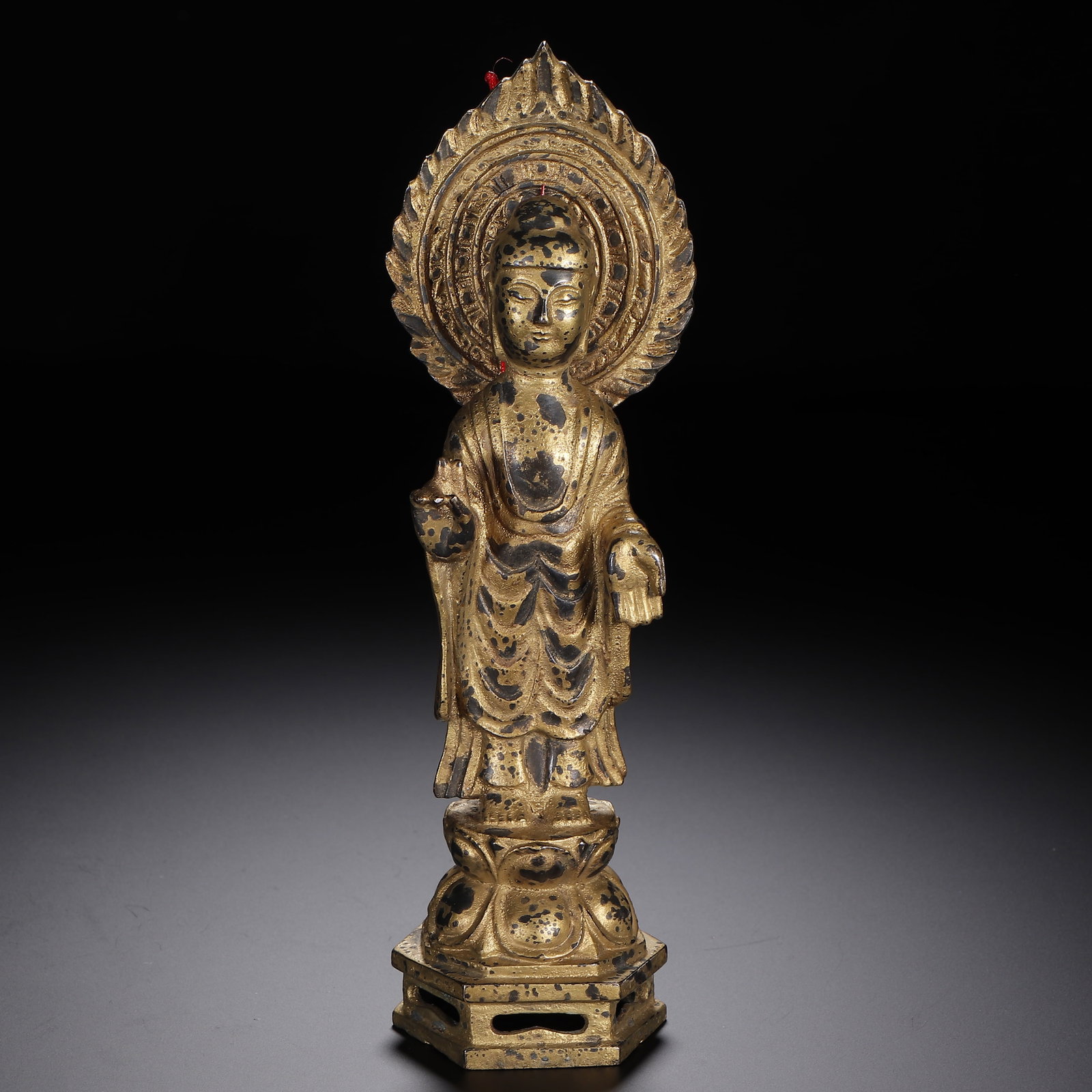 A GILT-BRONZE BUDDHA FIGURE (1 of 9)