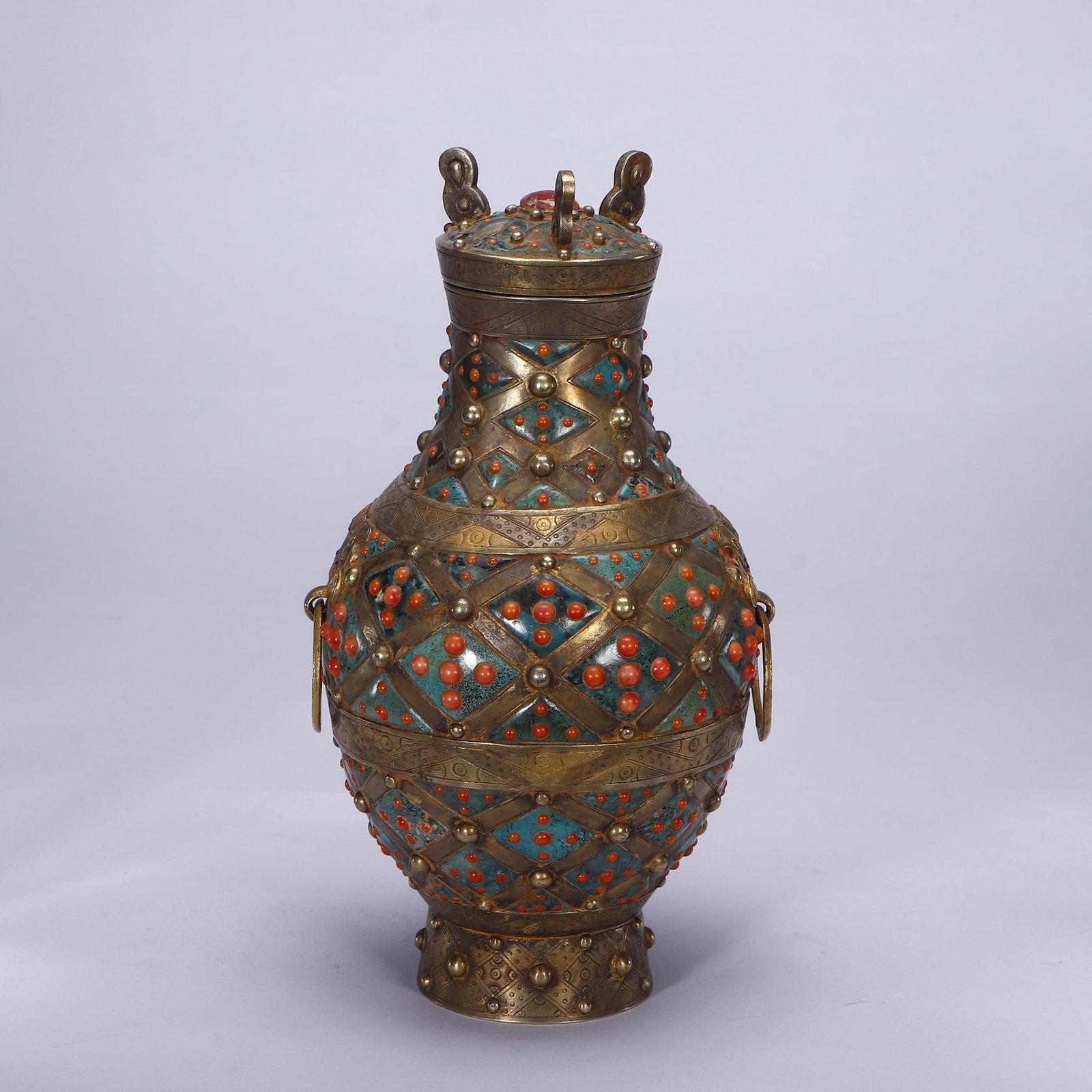 A SILVER-GILT JAR: A SILVER-GILT JAR Dimensions: Dimensions: Length: 11.5 cm (4.53 in.), Width: 11.5 cm (4.53 in.), Height: 20.5 cm (8.07 in.). Weight: 670 g. All measurements are approximate.