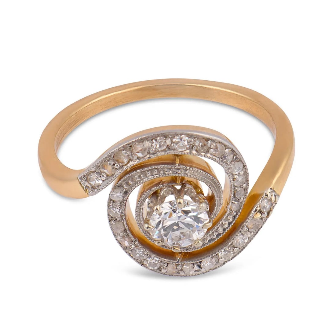 DIAMOND SWIRL RING, 18K GOLD: DIAMOND SWIRL RING, 18K GOLD Description: The ring is designed around a dynamic spiral composition that encircles a central round brilliant-cut diamond, creating a sense of motion and visual depth. Th