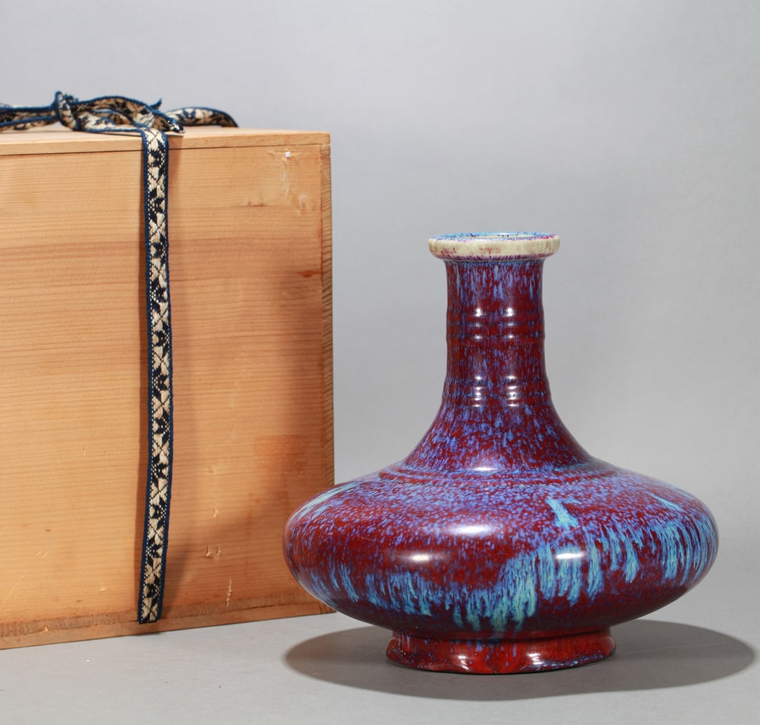A FLAMBÉ-GLAZED WATER CHESTNUT SHAPED VASE: A FLAMBÉ-GLAZED WATER CHESTNUT SHAPED VASE Dimensions: Height: 23 cm (9.06 in.). All measurements are approximate.