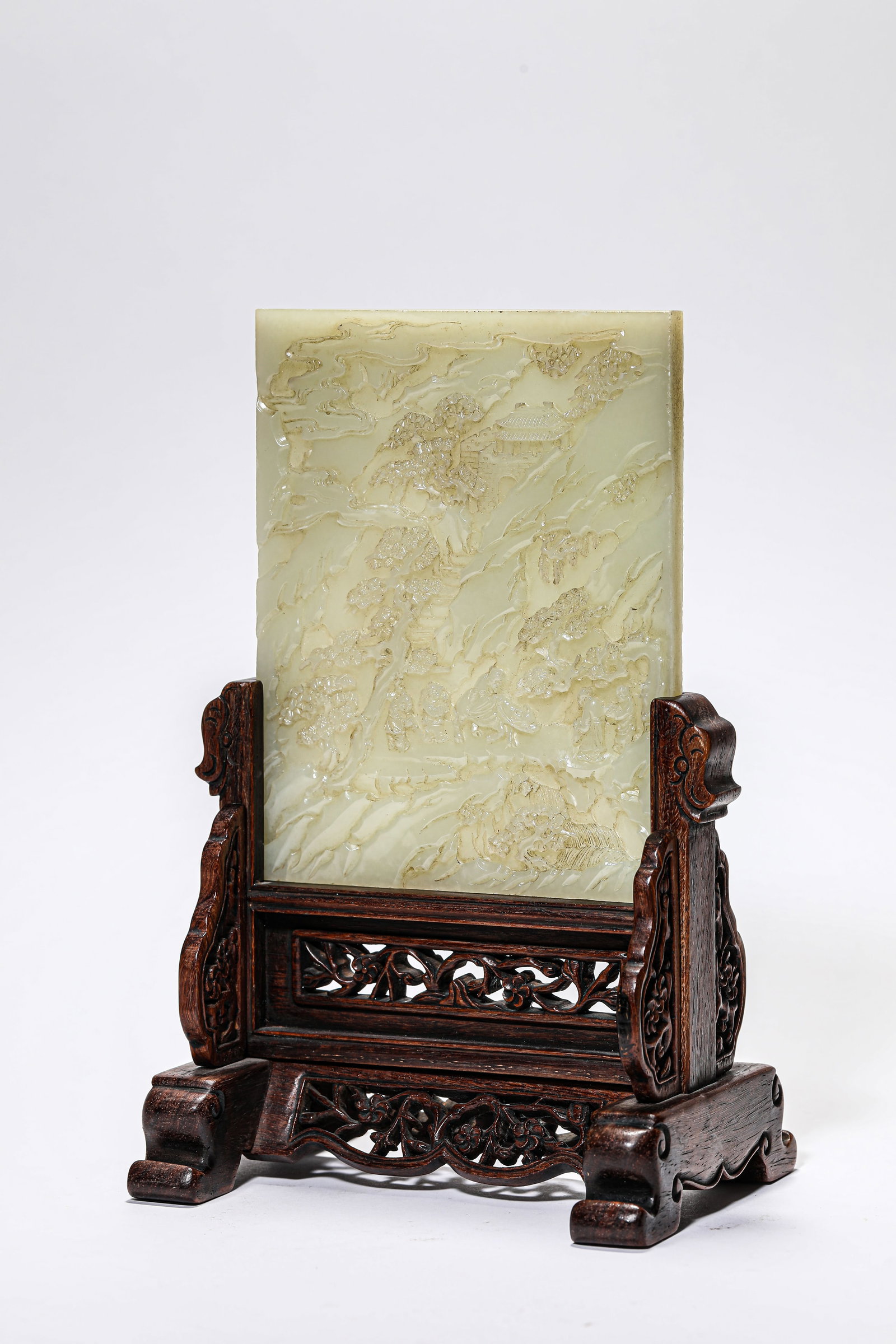 A JADE CARVED 'SCHOLAR UNDER PINES' TABLE SCREEN: A JADE CARVED 'SCHOLAR UNDER PINES' TABLE SCREEN Dimensions: Length: 14.8 cm (5.83 in.), Width: 11.5 cm (4.53 in.), Height: 22.8 cm (8.98 in.). All measurements are approximate.