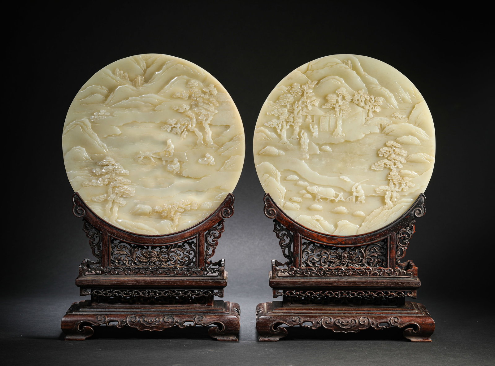 A PAIR OF JADE CARVED 'FIGURES AND STORY' TABLE SCREENS: A PAIR OF JADE CARVED 'FIGURES AND STORY' TABLE SCREENS Dimensions: Length: 18.5 cm (7.28 in.), Width: 9.4 cm (3.70 in.), Height: 30.5 cm (12.01 in.). All measurements are approximate.