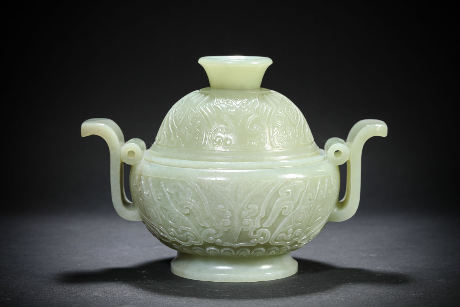 A JADE 'COURT CROWN EAR' CENSER: A JADE 'COURT CROWN EAR' CENSER Dimensions: Length: 20.4 cm (8.03 in.), Width: 14 cm (5.51 in.), Height: 14.3 cm (5.63 in.). All measurements are approximate.