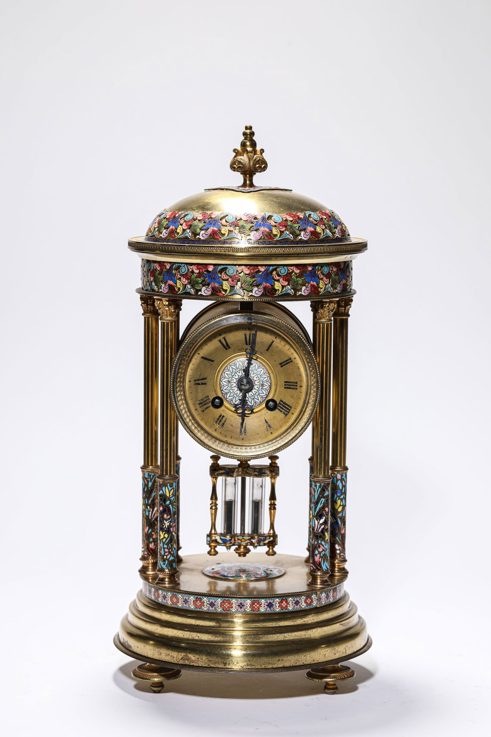 A GILT DECORATED-BRONZE AND CLOISONNE ENAMEL PAVILION CLOCK: A GILT DECORATED-BRONZE AND CLOISONNE ENAMEL PAVILION CLOCK Dimensions: Length: 19 cm (7.48 in.), Width: 40.5 cm (15.94 in.). Weight: 5.25 kg. All measurements are approximate.