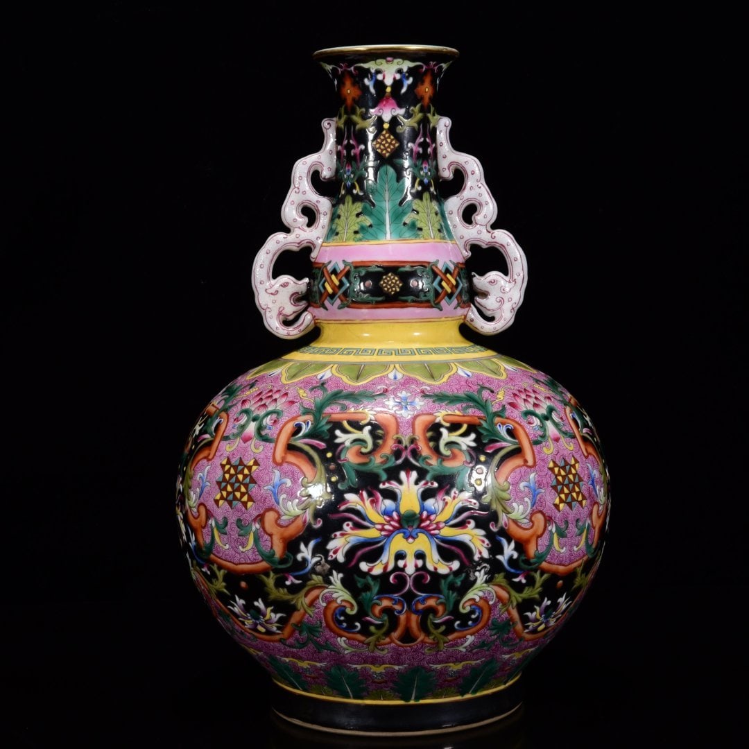 A FAMILLE ROSE 'PASSION FLOWER' DOUBLE-HANDLE VASE: A FAMILLE ROSE 'PASSION FLOWER' DOUBLE-HANDLE VASE Dimensions: Length: 32 cm (12.60 in.), Width: 20 cm (7.87 in.). All measurements are approximate.