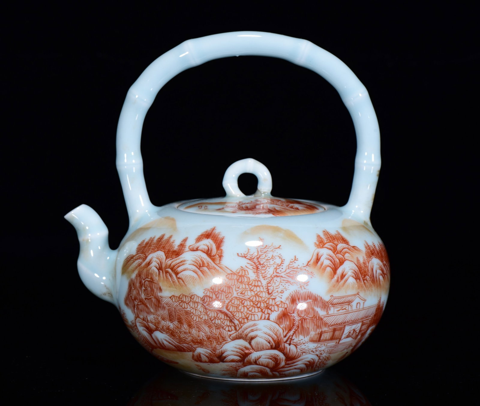 AN IRON-RED 'LANDSCAPE' LOOP-HANDLE EWER (1 of 9)
