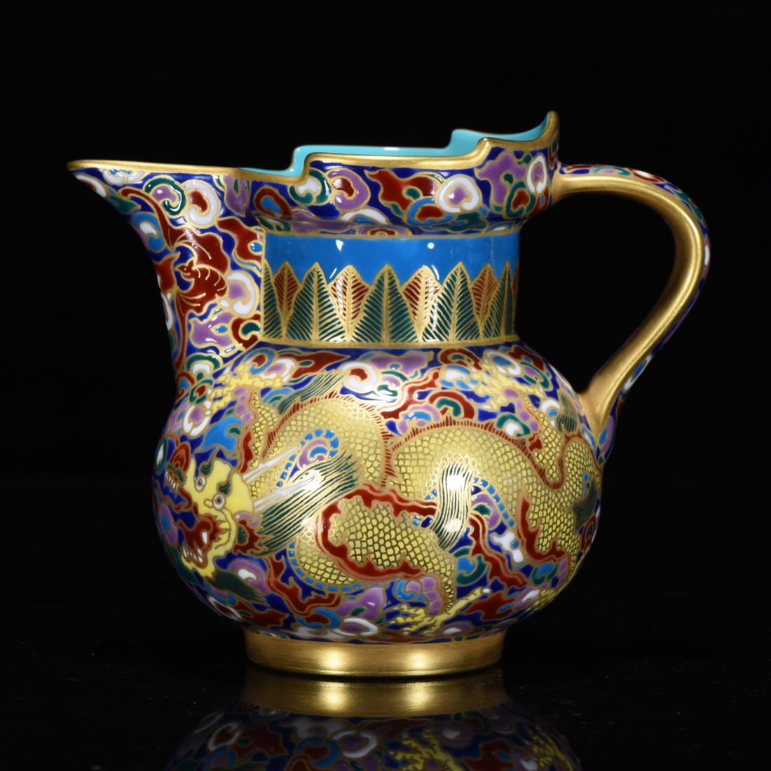 AN ENAMEL GILT DECORATED EWER: AN ENAMEL GILT DECORATED EWER Dimensions: Length: 10 cm (3.94 in.), Width: 11 cm (4.33 in.). All measurements are approximate.
