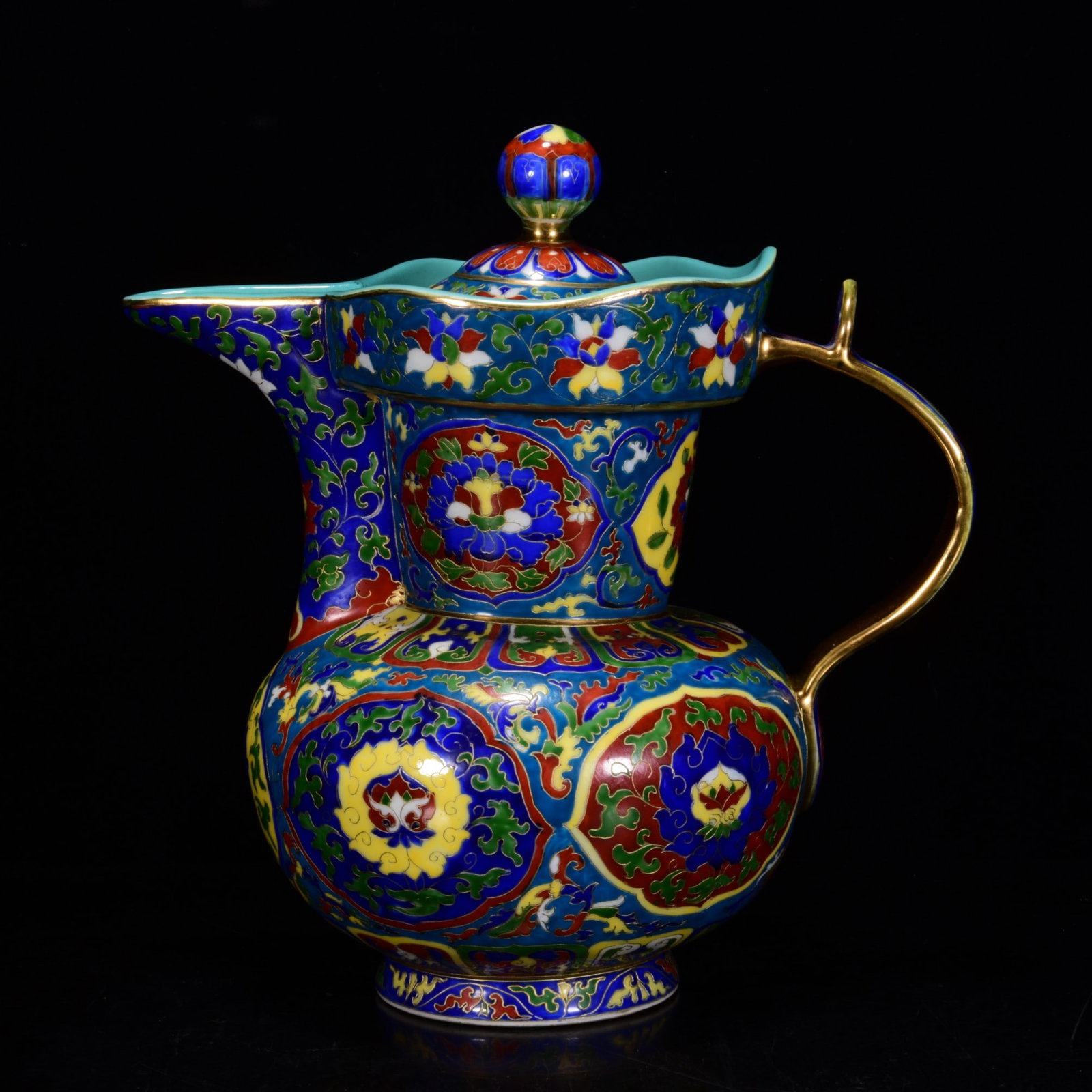 A CLOISONNE ENAMEL MONK'S-CAP EWER: A CLOISONNE ENAMEL MONK'S-CAP EWER Dimensions: Length: 24 cm (9.45 in.), Width: 21 cm (8.27 in.). All measurements are approximate.