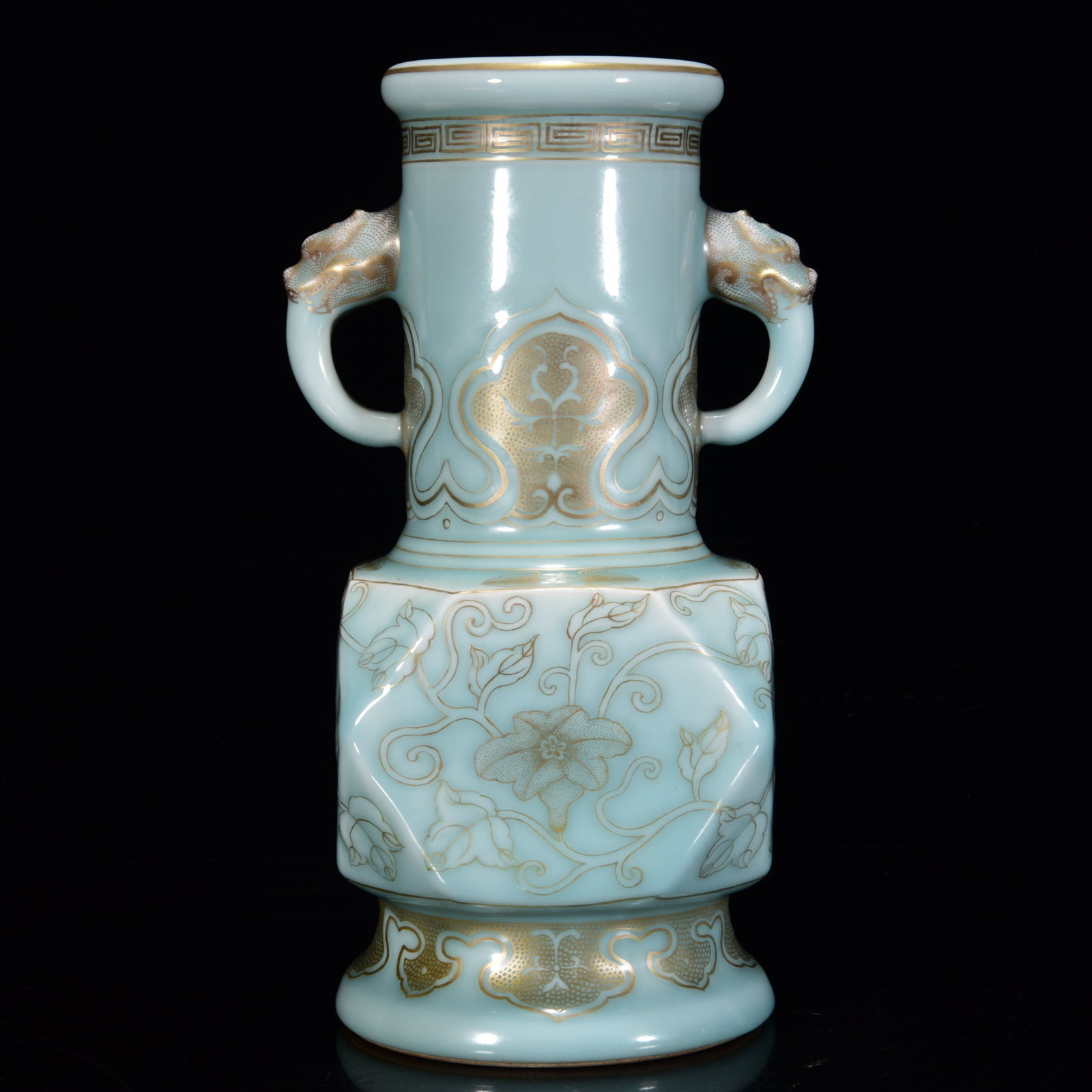 A SKY-BLUE GLAZED GILT DECORATED ELEPHANT-HANDLE SQUARE VASE: A SKY-BLUE GLAZED GILT DECORATED ELEPHANT-HANDLE SQUARE VASE Dimensions: Length: 31 cm (12.20 in.), Width: 15 cm (5.91 in.). All measurements are approximate.