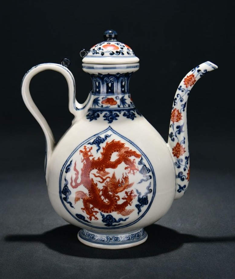 A BLUE AND WHITE AND IRON-RED 'DRAGON' EWER (1 of 9)