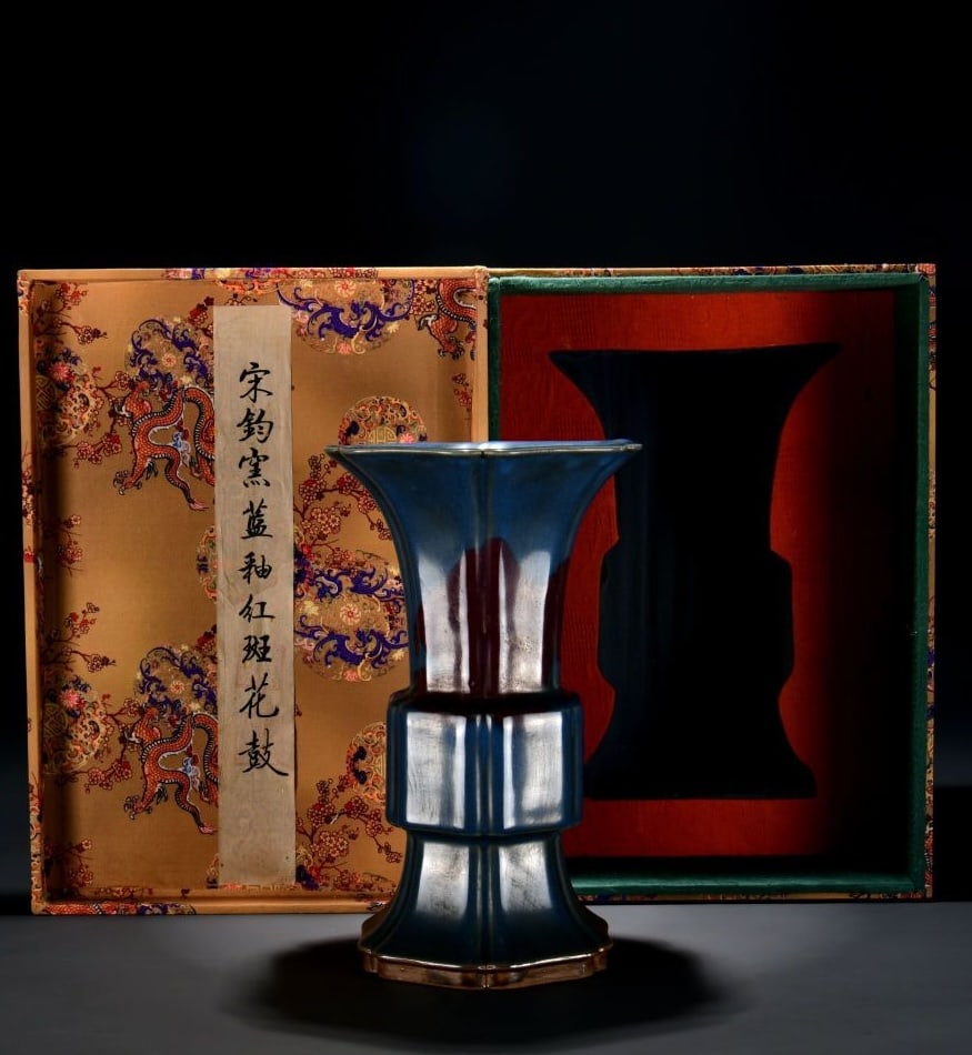A JUN TYPE BLUE-GLAZED RED-SPLASH FLOWER DRUM: A JUN TYPE BLUE-GLAZED RED-SPLASH FLOWER DRUM Dimensions: Length: 23 cm (9.06 in.), Width: 16.5 cm (6.50 in.). All measurements are approximate.