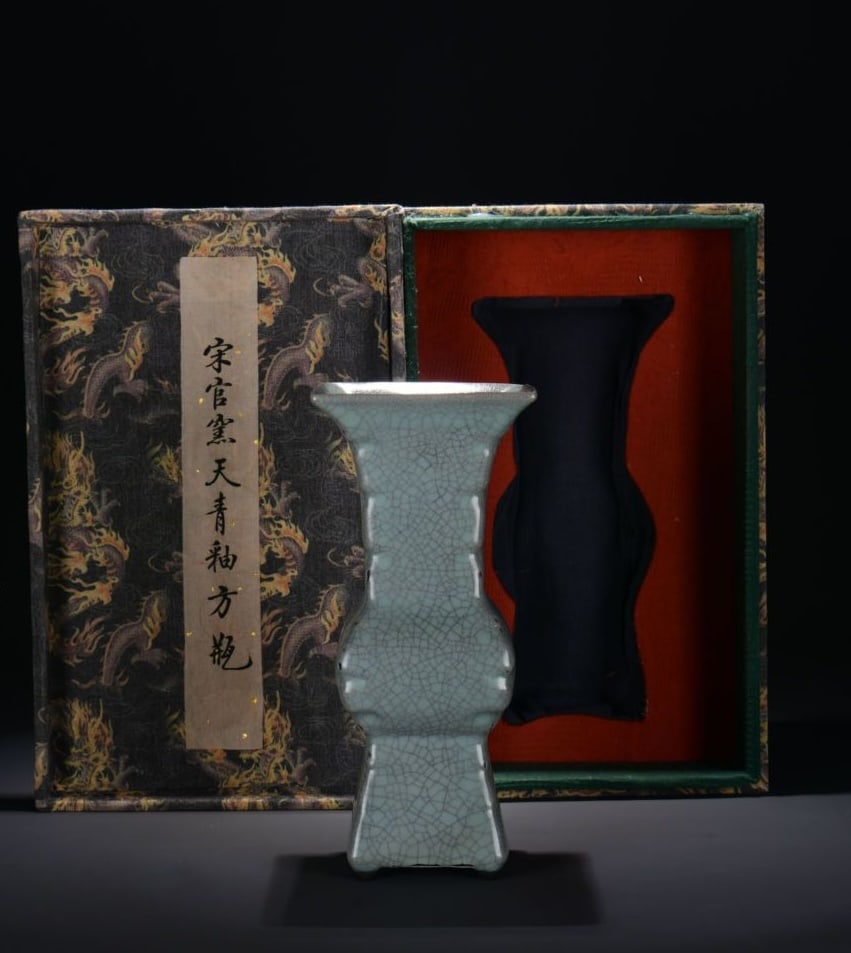 A SKY-BLUE GLAZED SQUARE VASE: A SKY-BLUE GLAZED SQUARE VASE Dimensions: Height: 23 cm (9.06 in.), Width: 10 cm (3.94 in.). All measurements are approximate.