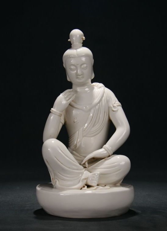 A DEHUA WHITE-GLAZED 'HE CHAOZONG' MARK SEATED BODHISATTVA IN CONTEMPLATION (1 of 9)