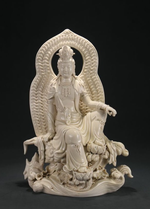 A DEHUA WHITE-GLAZED 'HE CHAOZONG' MARK GUANYIN BY WATER (1 of 9)