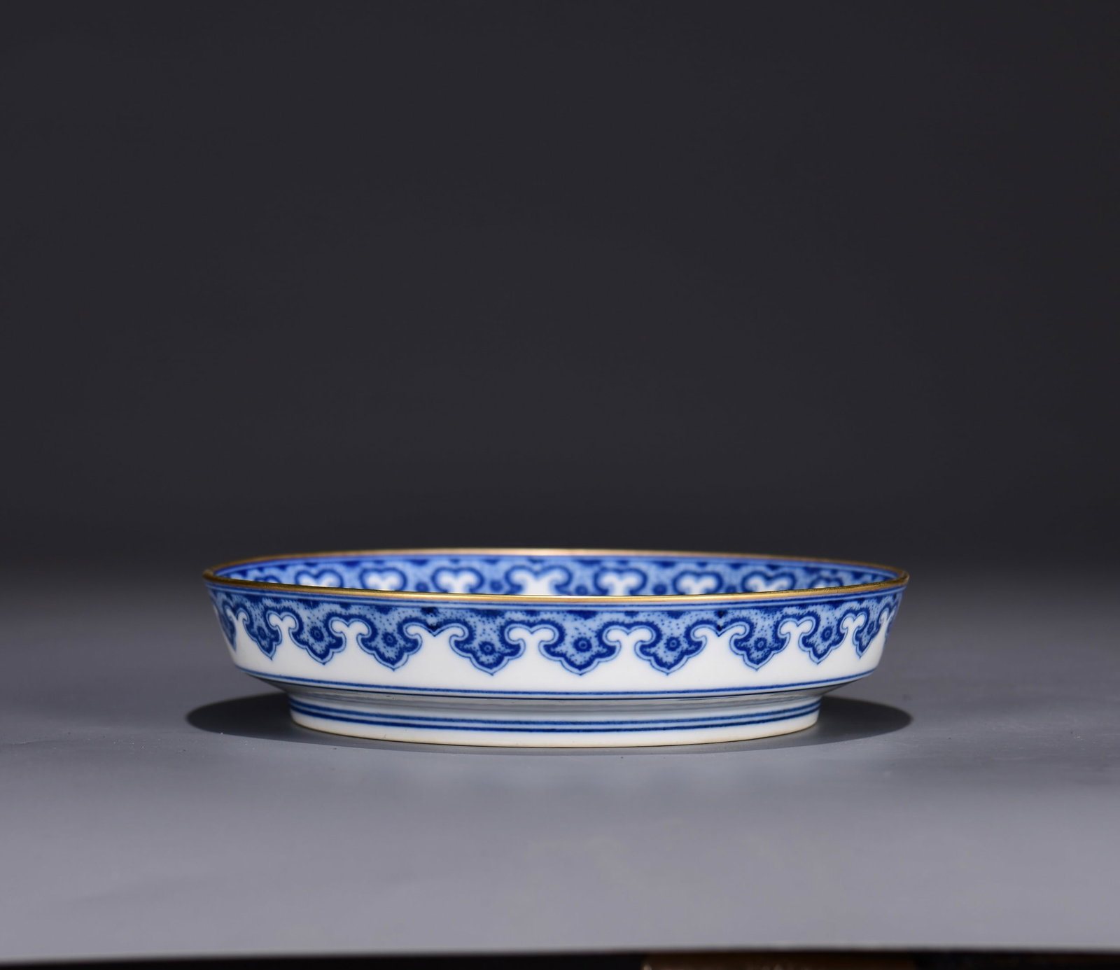 A BLUE AND WHITE 'WAVES AND DRAGON' BRUSH WASHER: A BLUE AND WHITE 'WAVES AND DRAGON' BRUSH WASHER Dimensions: Length: 4 cm (1.57 in.), Width: 17 cm (6.69 in.). All measurements are approximate.