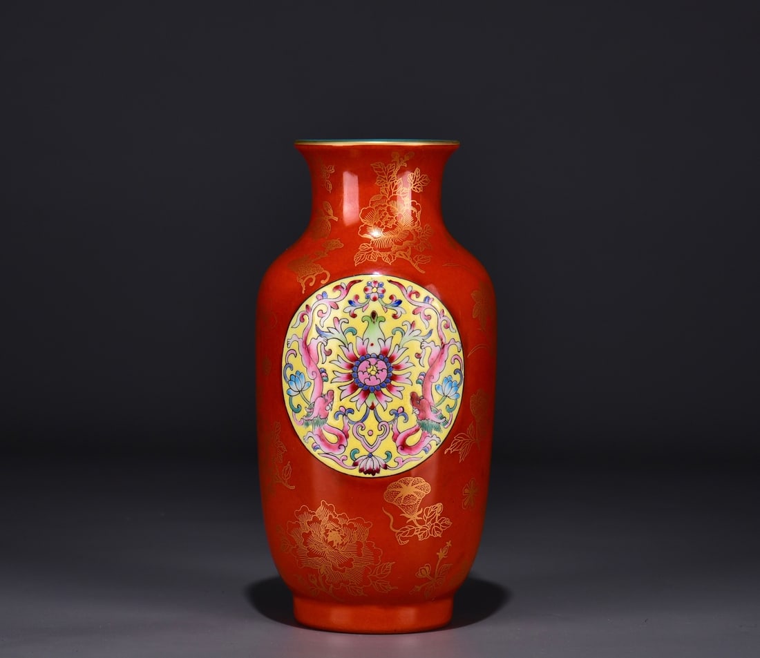 A PERSIMMON RED-GLAZED GILT DECORATED MEDALLION ENAMEL VASE: A PERSIMMON RED-GLAZED GILT DECORATED MEDALLION ENAMEL VASE Dimensions: Length: 22 cm (8.66 in.), Width: 11 cm (4.33 in.). All measurements are approximate.