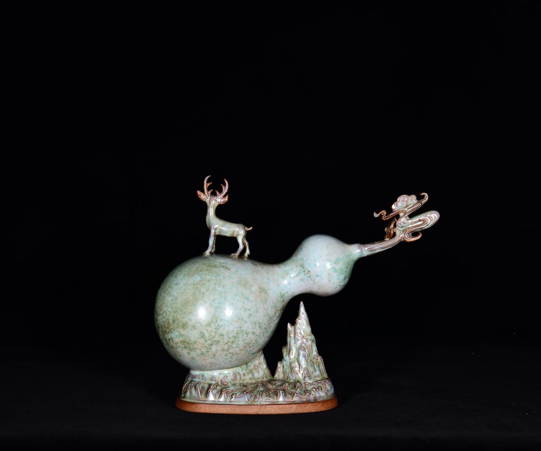 A JUN TYPE 'FORTUNE MOUNTAIN AND OFFICIAL SEA' ORNAMENT: A JUN TYPE 'FORTUNE MOUNTAIN AND OFFICIAL SEA' ORNAMENT Dimensions: Length: 36 cm (14.17 in.), Width: 29 cm (11.42 in.). All measurements are approximate.