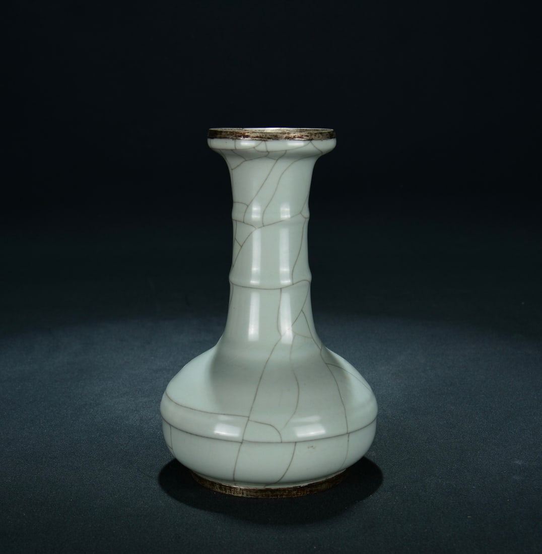 AN OFFICIAL QINGBAI GLAZED SILVER-MOUNTED LONG-NECK VASE: AN OFFICIAL QINGBAI GLAZED SILVER-MOUNTED LONG-NECK VASE Dimensions: Length: 18 cm (7.09 in.), Width: 11 cm (4.33 in.). All measurements are approximate.