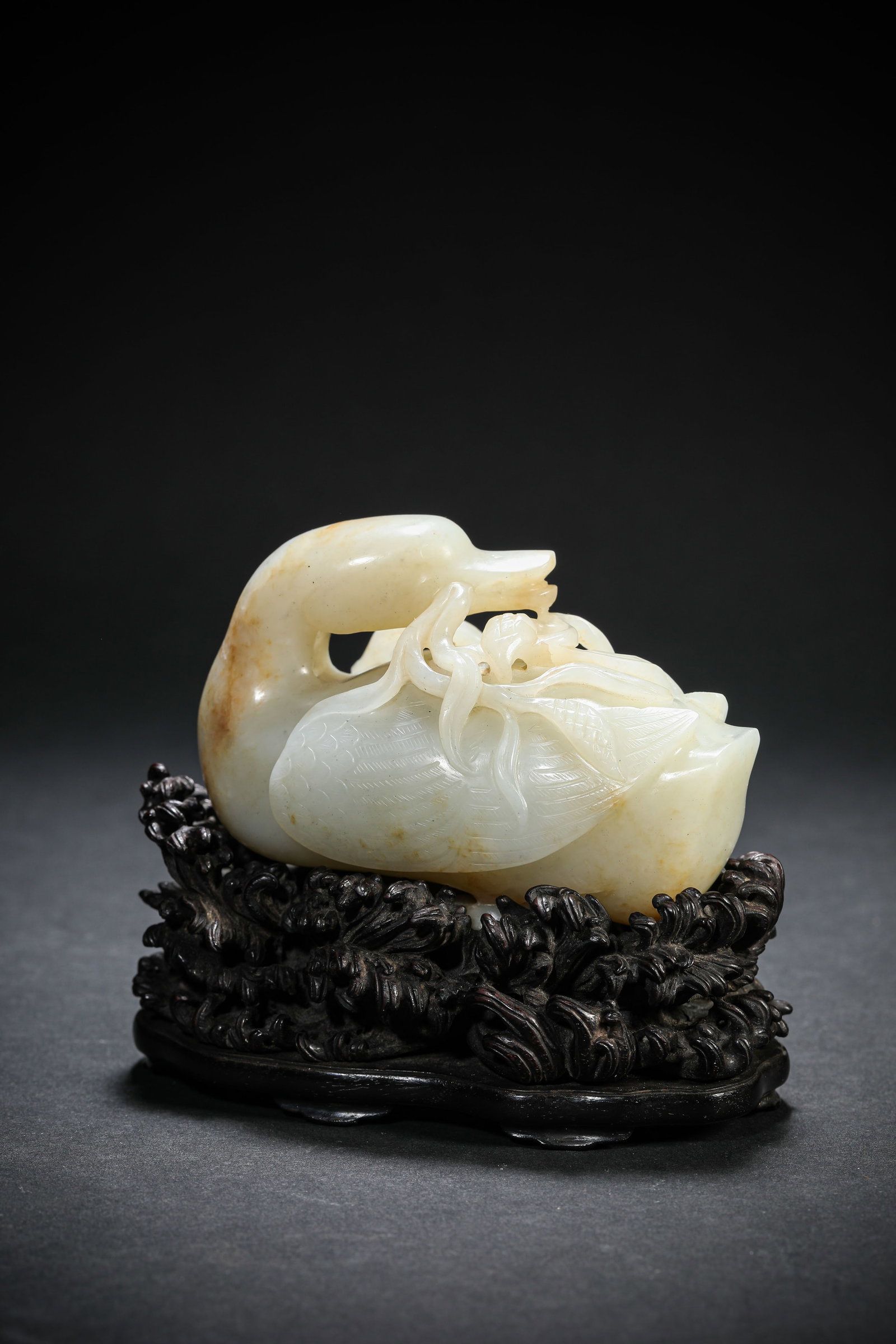 A JADE GOOSE: A JADE GOOSE Dimensions: Length: 9.4 cm (3.70 in.), Width: 4.7 cm (1.85 in.), Height: 6.8 cm (2.68 in.). All measurements are approximate.
