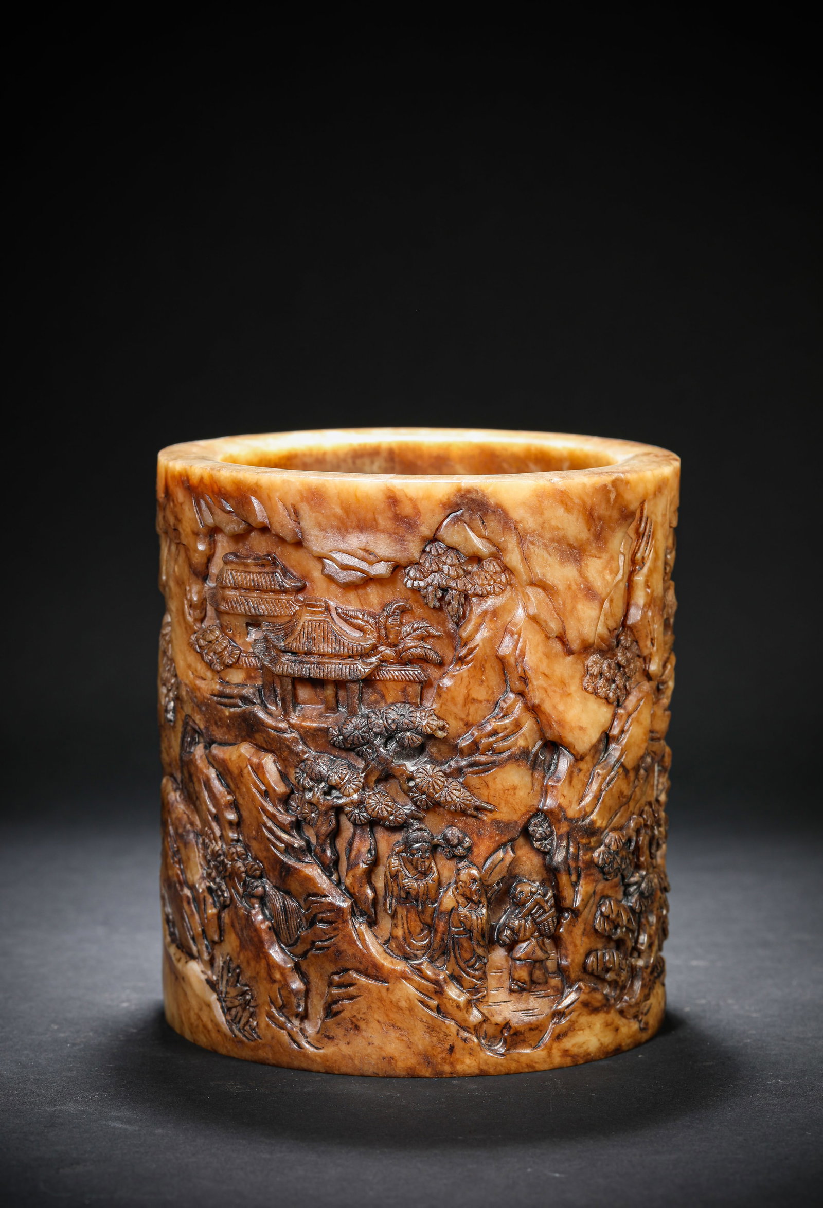 A JADE CARVED 'FIGURES' BRUSH POT: A JADE CARVED 'FIGURES' BRUSH POT Dimensions: Width: 14 cm (5.51 in.), Height: 15.5 cm (6.10 in.). All measurements are approximate.