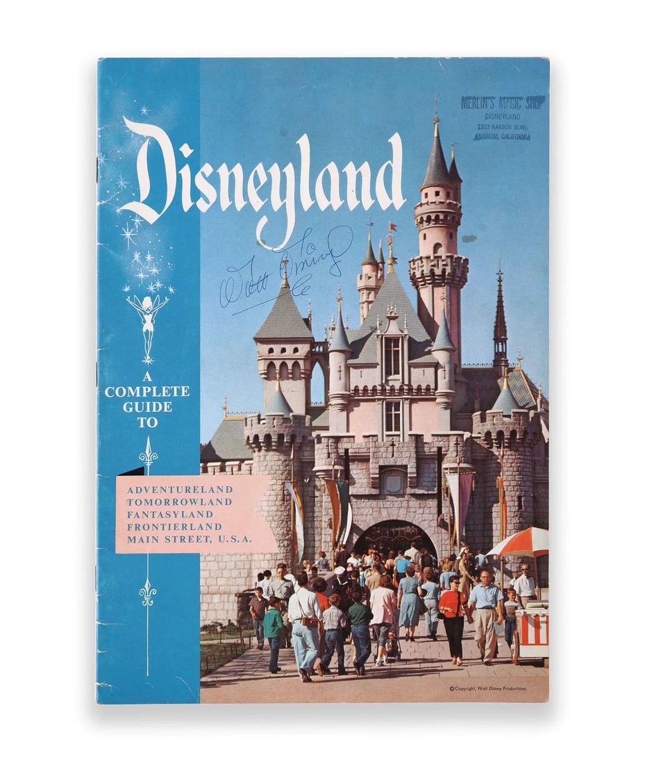 WALT DISNEY - SIGNED DISNEYLAND SOUVENIR GUIDE (WALT DISNEY PRODUCTIONS, C. 1950S): WALT DISNEY - SIGNED DISNEYLAND SOUVENIR GUIDE (WALT DISNEY PRODUCTIONS, C. 1950S) Provenance and Authenticity: This original Disneyland souvenir guide, featuring the iconic Sleeping Beauty Castle on 
