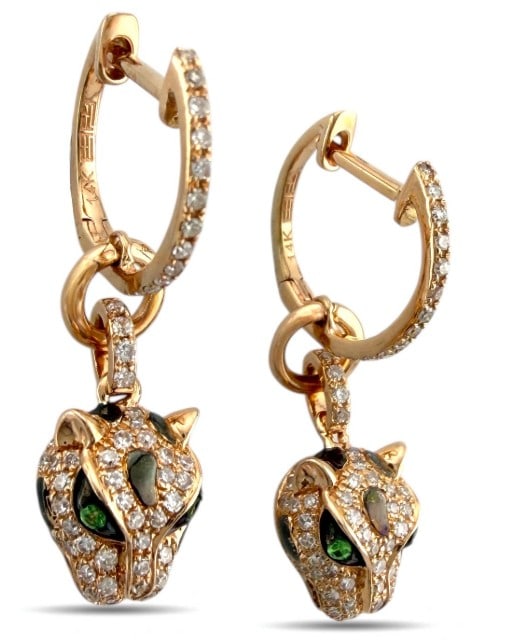 LEOPARD PRINT EARRINGS: LEOPARD PRINT EARRINGS Description: This exquisitely carved leopard print earring, with its delicate details, perfectly blends elegance and individuality. The earrings are crafted from warm 14K rose