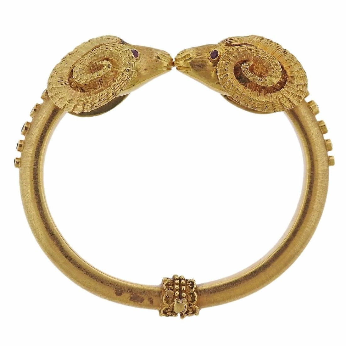 AN 18K YELLOW GOLD BRACELET SET WITH RUBIES AND SAPPHIRES (1 of 1)