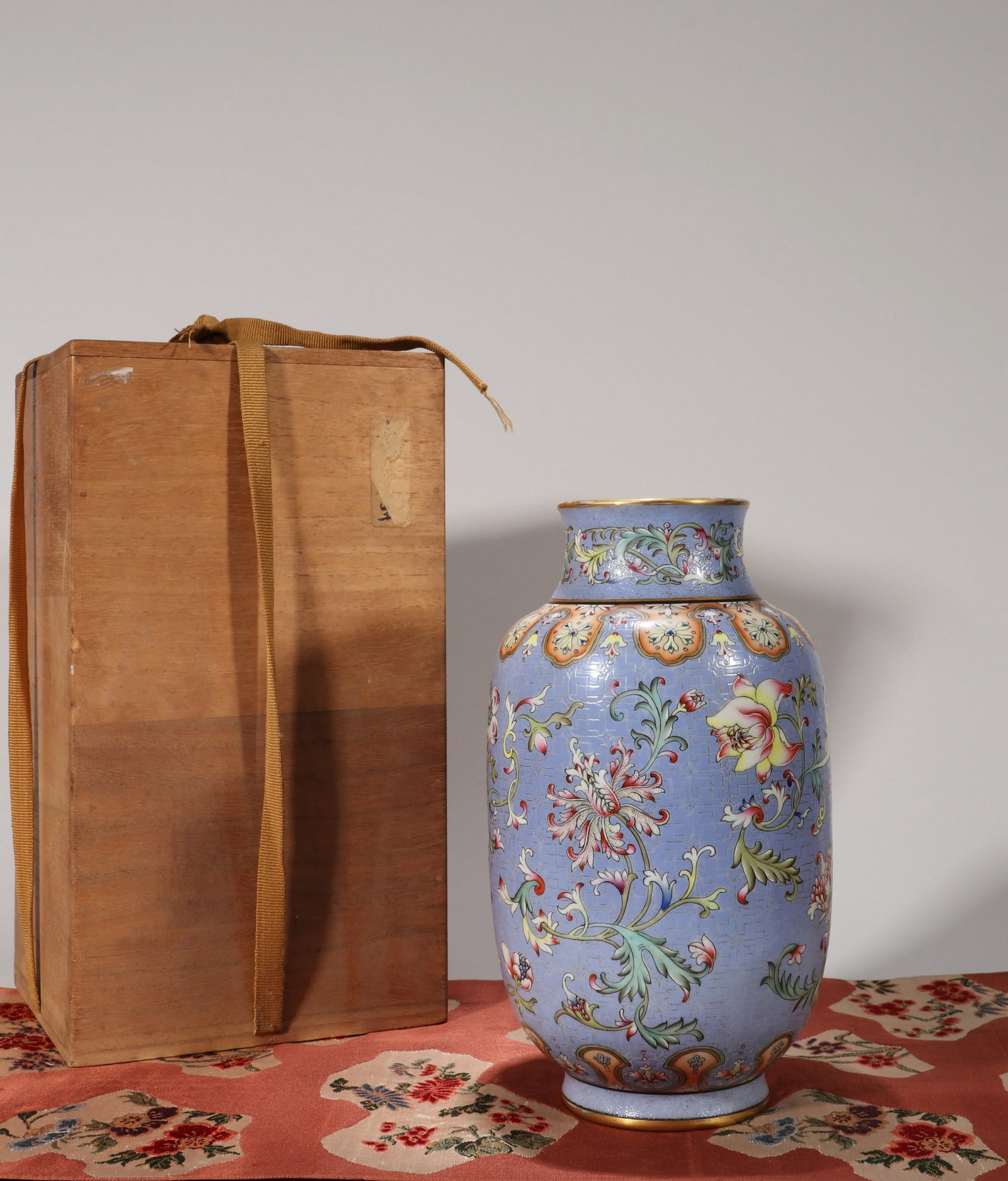 A BLUE-GROUND YANGCAI 'FLOWERS' LANTERN VASE