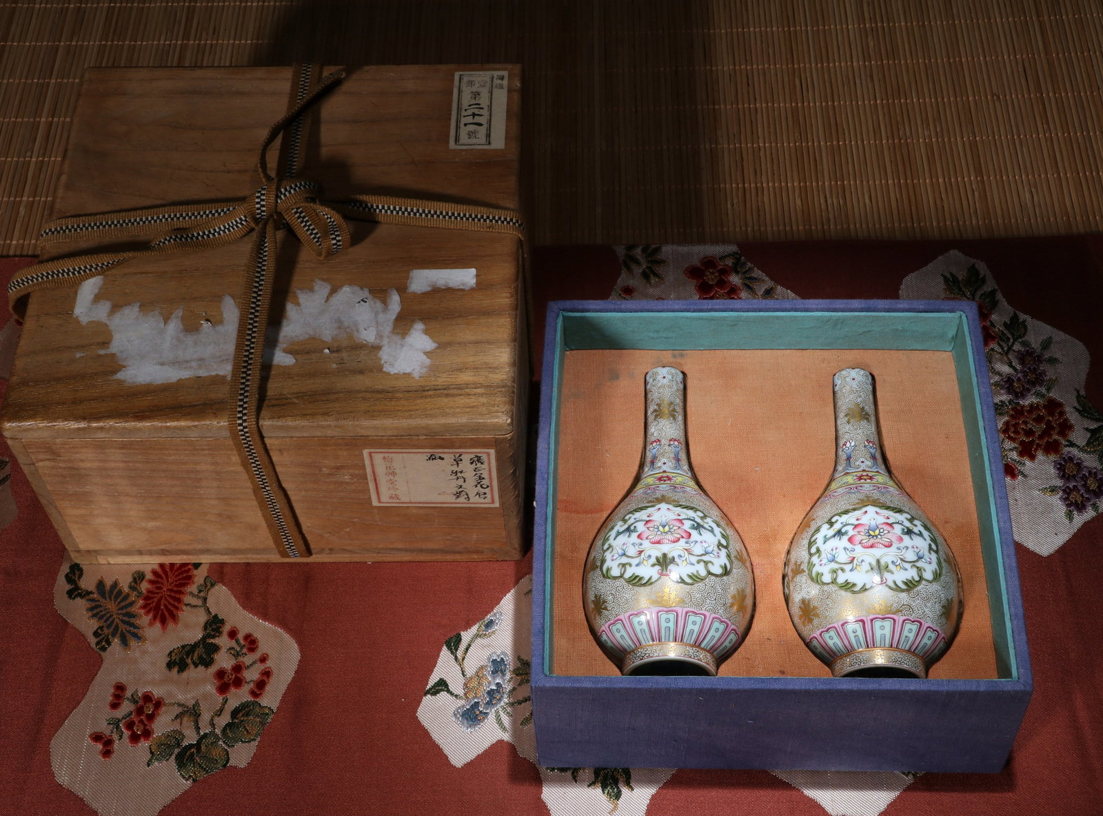 A PAIR OF YANGCAI 'FLOWERS' VASES